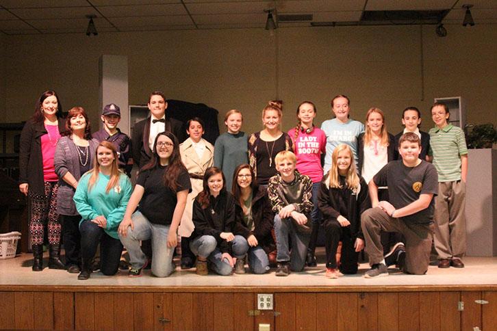 After the performance of their play, The Potman Spoke Sooth, the cast, crew, and directors posed on stage for a picture.
