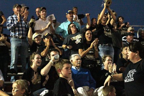 Fans cheer on the Wildcats as they get their first win of the season.