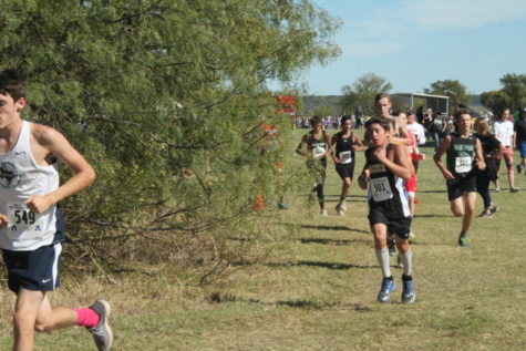 Freshman Kannon Rice runs at the regional cross country meet on Oct 23 in Grand Prairie. Rice placed 62nd. 