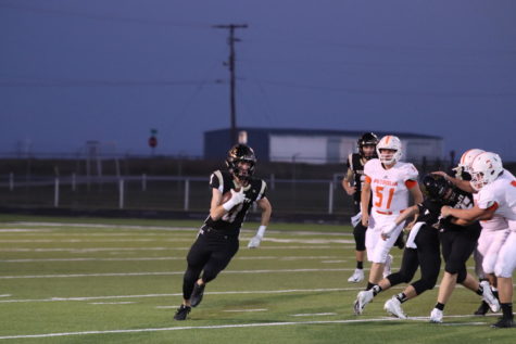 Senior Conner Byrd runs the ball in the Wildcats 62-7 win over Petrolia