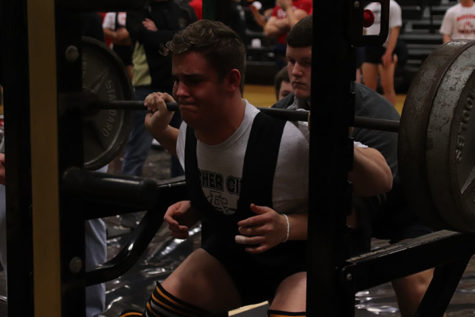 Chase Stafford squats at the Archer City powerlifting meet. He placed first in his weight division.