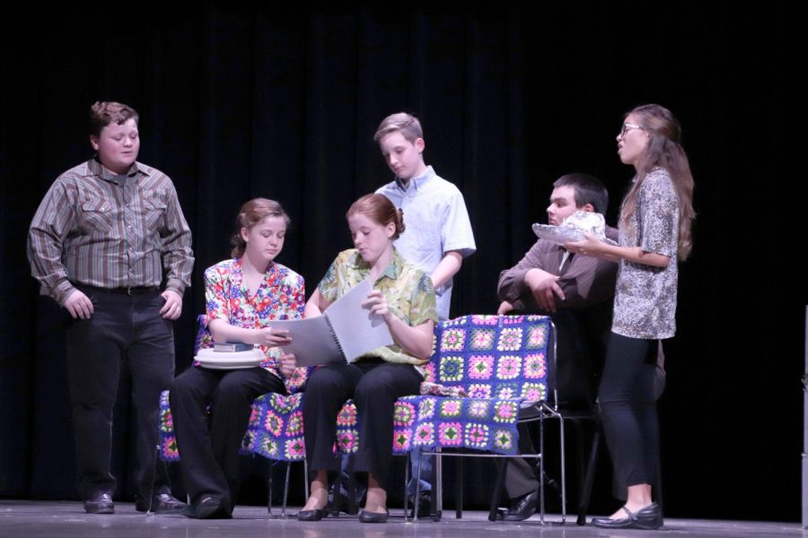 Eighth graders Bonner Hand, Leiah Graham, Justine Neely, Chase Curry, Dylan Hall and Kassidy Marin perform a scene from Dearly Departed.