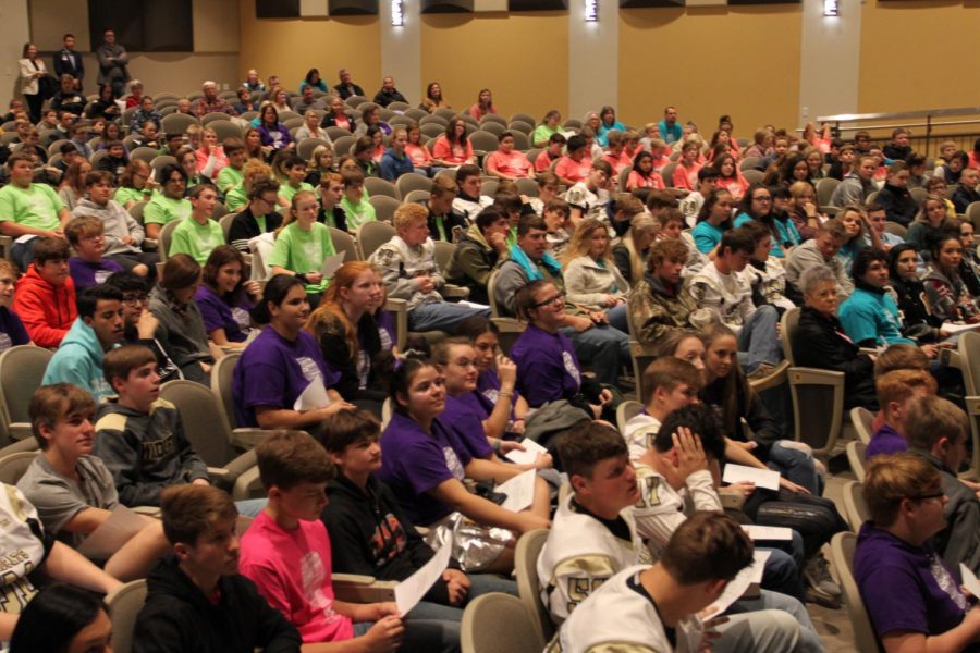 The school listens to a presentation made by the Keynote Speaker