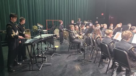 The Prowlin’ Growlin’ Wildcat band waits to perform their contest pieces at the Seymour auditorium. 