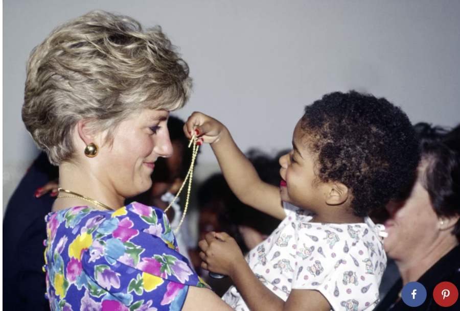 Diana visiting a hospital in San Paulo, Brazil and hugging HIV-positive children in 1991 