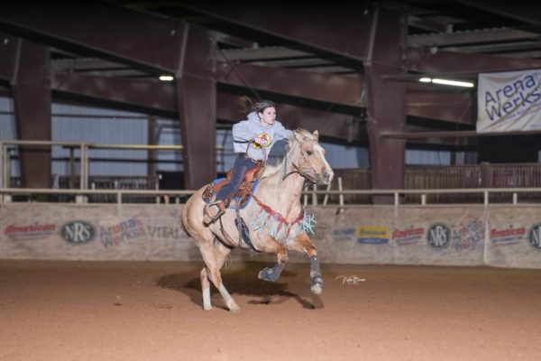 Freshman Makaligha Beamon barrel races with her horse Whiskey at the NRS arena in Decatuar