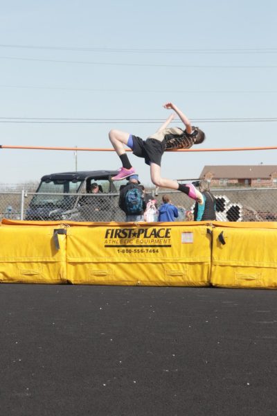 Junior High student competes in high jump