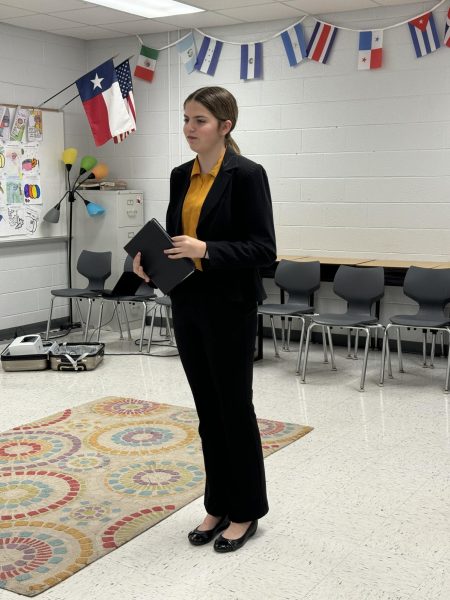 Freshman Jocelyn Tedrow practices her poetry piece at the Holliday invitational UIL meet. Photo by Carol Cox.