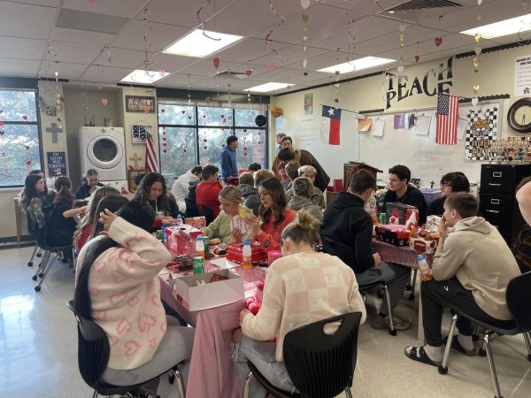 Members of the senior class participate in a Valentine's Day party as they did in elementary school.